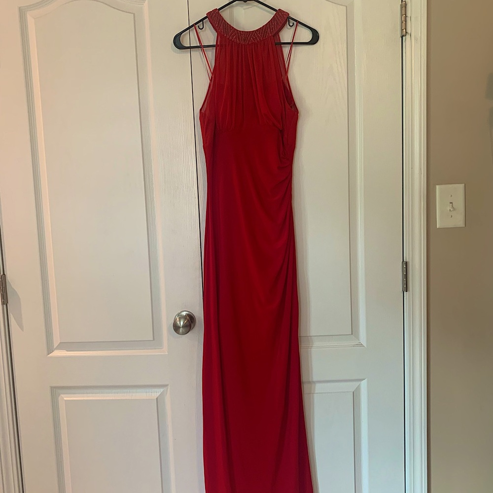 Ladies red hugging gown size 4